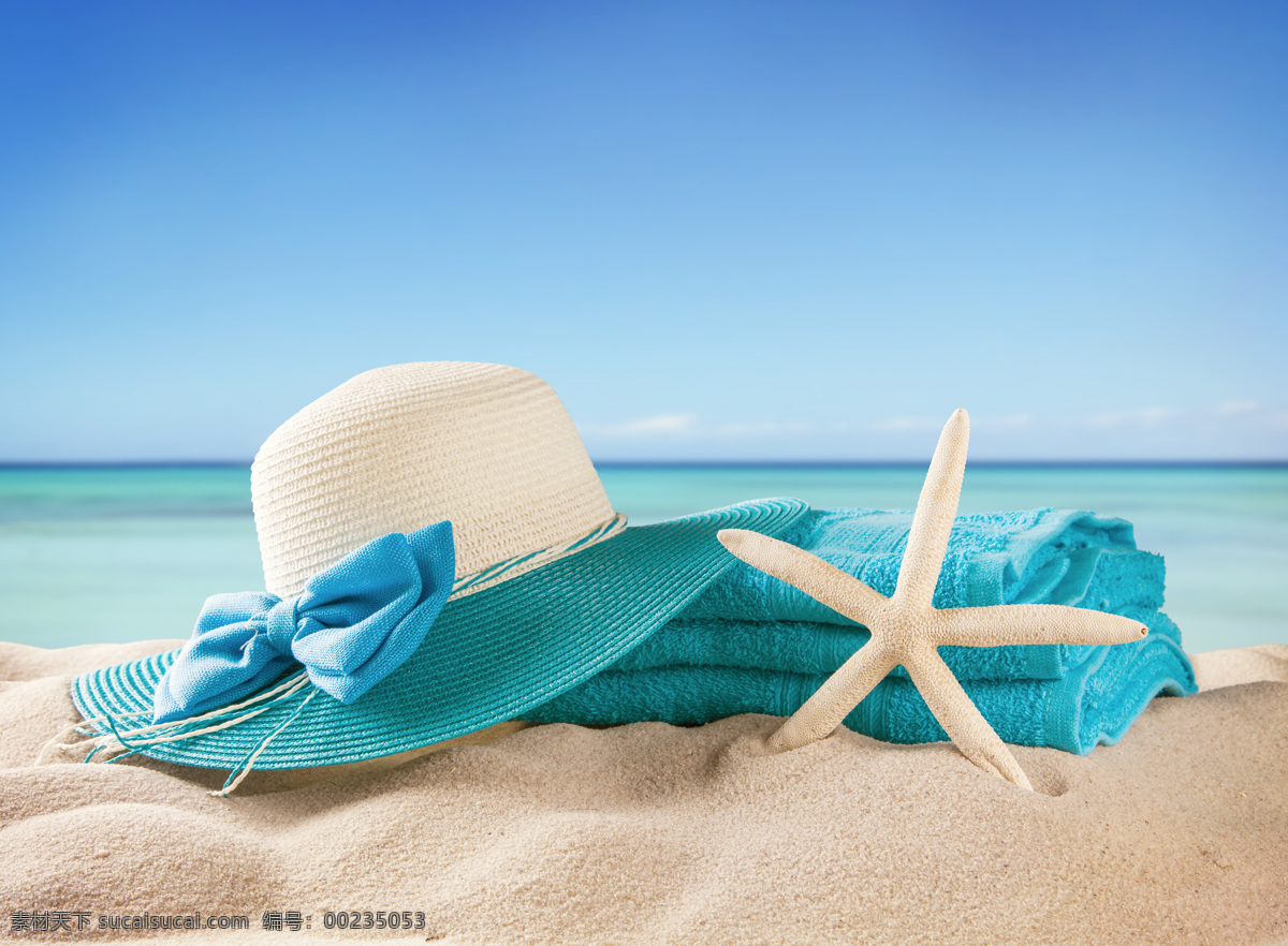 沙滩 上 帽子 海星 大海 浴巾 大海图片 风景图片
